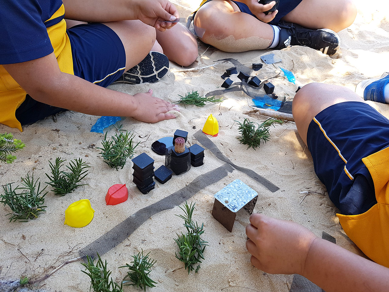 Air-and-Transport Close up of kids playing in sandpit